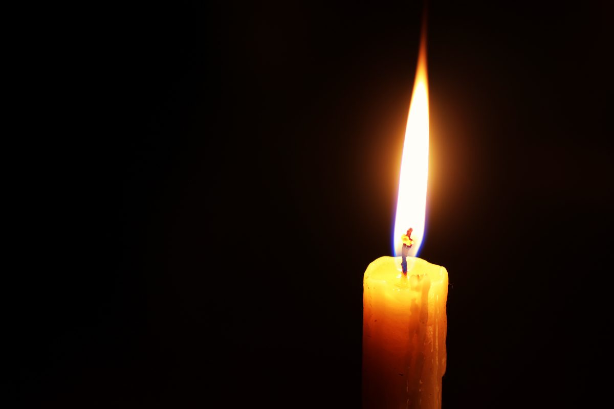 Candle Flame Isolated On Black Religion Concept